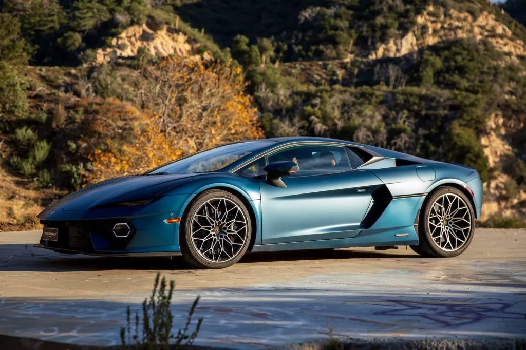 Lamborghini Temerario mid-engined hybrid supercar photographed in a dramatic modern setting
