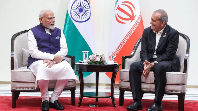 Prime Minister Narendra Modi shaking hands with Iranian President Masoud Pezeshkian in Bishkek.