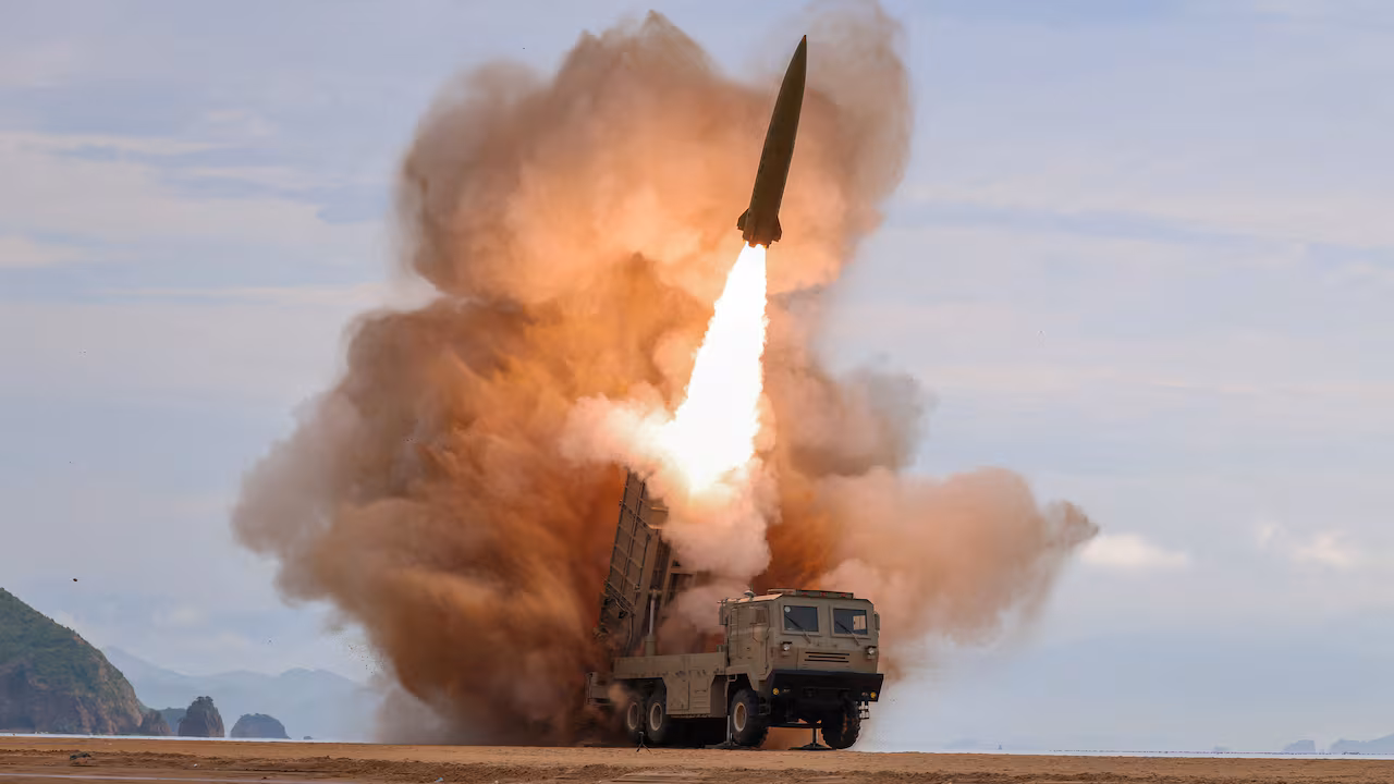 A military radar screen tracking projectile trajectories across the Sea of Japan.