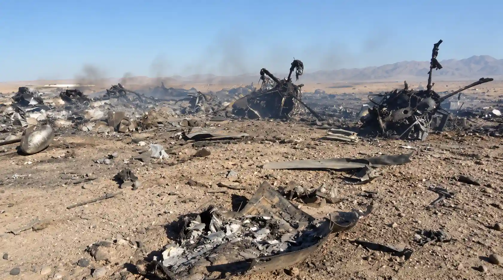 A rugged, mountainous desert landscape similar to the Iranian terrain where the US pilot evaded capture.