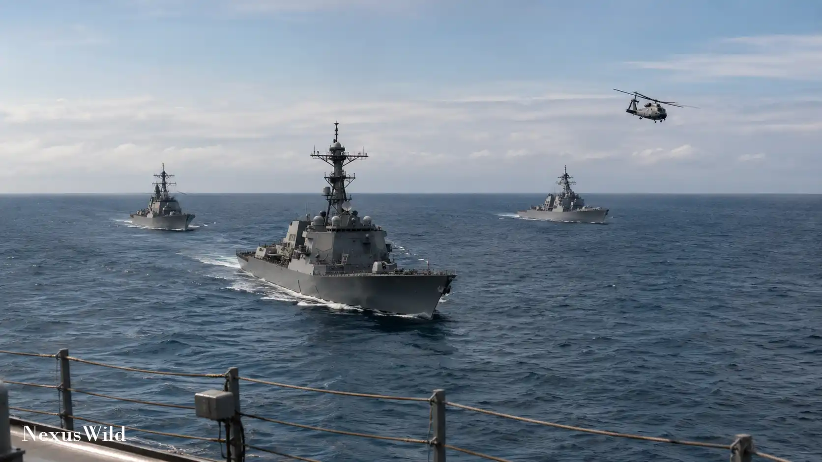 Naval ships from the US, South Korea, and Japan sailing in formation.